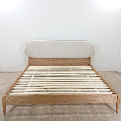 Dvoulůžková masivní postel s roštem 180x200 cm Octavia Kave Home